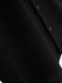 Dżersejowa koszula z zapięciem na guziki