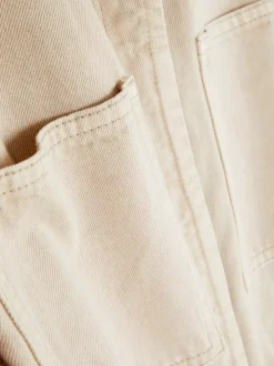 Funkcjonalny kombinezon z wiązaniem w talii