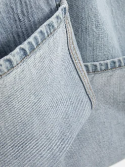 Jeansy i podwiniętą nogawką The Edit