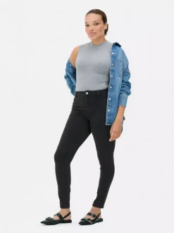 Jeansy skinny ze średnim stanem Essential