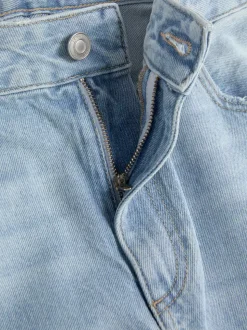 Jeansy typu barrel z postrzępionym obszyciem