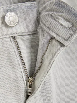 Jeansy typu mom z rozdarciami