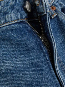 Jeansy typu mom z rozdarciami