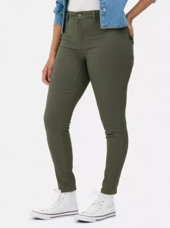 Jeansy ze średnim stanem o kroju skinny | standard