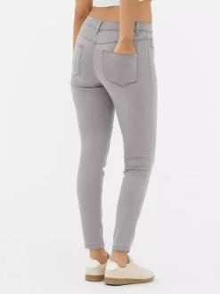 Jeansy ze średnim stanem o kroju skinny | standard