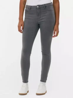 Jeansy ze średnim stanem o kroju skinny | standard