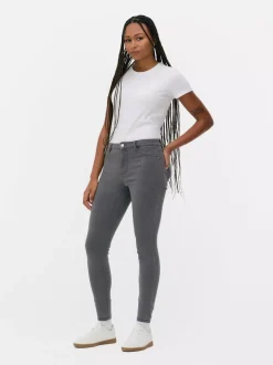 Jeansy ze średnim stanem o kroju skinny | standard