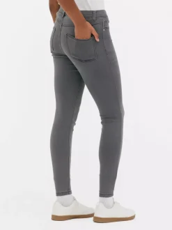 Jeansy ze średnim stanem o kroju skinny | standard