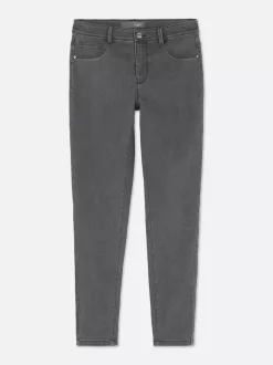 Jeansy ze średnim stanem o kroju skinny | standard