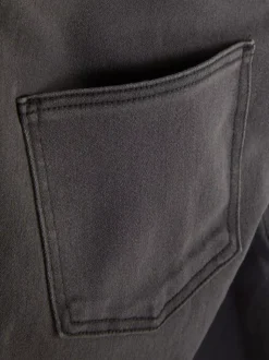 Jeansy ze średnim stanem o kroju skinny | standard