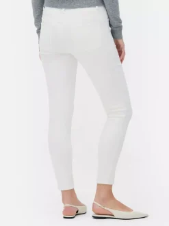 Jeansy ze średnim stanem o kroju skinny | standard