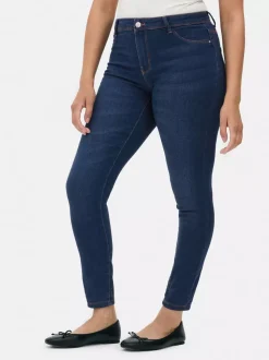 Jeansy ze średnim stanem o kroju skinny | standard