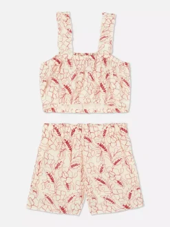 Komplet z topem i szortami z kwiatowym haftem