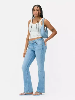 Koszulka na ramiączkach z ażurowym wzorem i falbanką