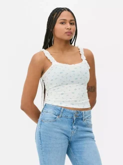 Koszulka na ramiączkach z ażurowym wzorem i falbanką