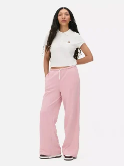 Koszulka polo z krótkim rękawem i haftowanym misiem