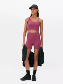 Krótki asymetryczny top Kappa x Primark