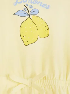 Krótki kombinezon w kwiaty z falbankami