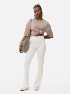 Legginsy do jogi z rozkloszowanymi nogawkami