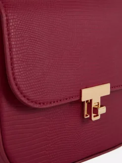 Mała torba na ramię z klapką