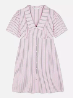 Minisukienka popołudniowa w paski z guzikami