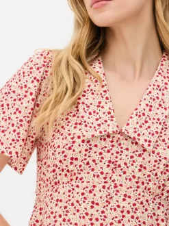 Minisukienka popołudniowa z kołnierzykiem na guzik