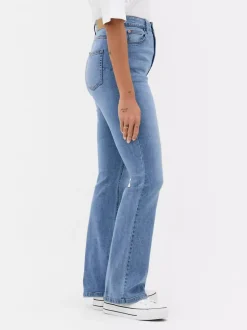 Modelujące jeansy o kroju slim z rozszerzaną nogawką