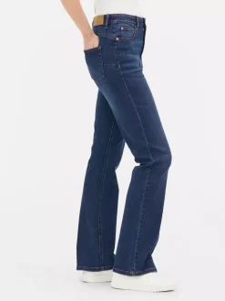 Modelujące jeansy o kroju slim z rozszerzaną nogawką