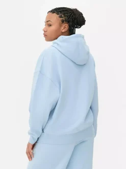 Oversize'owa bluza z kapturem i nadrukiem