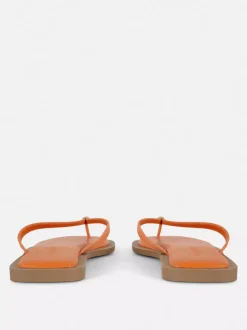 Płaskie sandały-japonki ze zdobieniem przy palcach