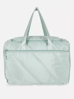 Pikowana torba kabinowa mieszcząca się pod fotelem