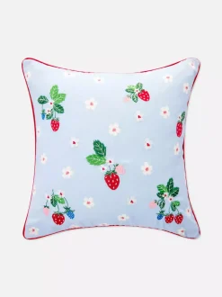 Poduszka ze wzorem w kwiaty i truskawki