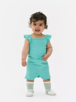 Prążkowany kombinezon z falbanką