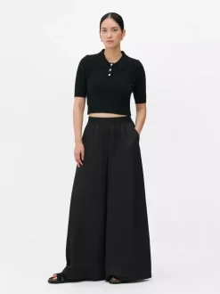 Satynowe spodnie z szeroką nogawką The Edit