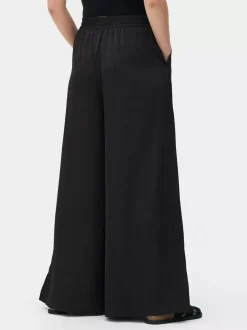 Satynowe spodnie z szeroką nogawką The Edit