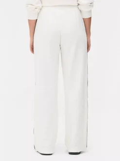 Spodnie dresowe z prostą nogawką w stylu uczelnianym