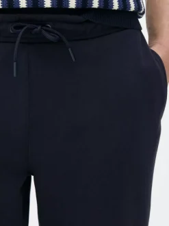 Spodnie dresowe ze sznurkiem i ściąganymi nogawkami