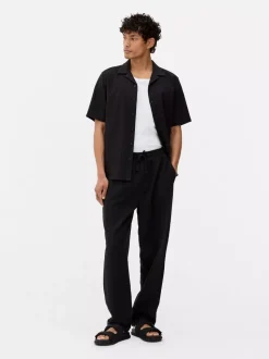 Spodnie w paski z tkaniny seersucker