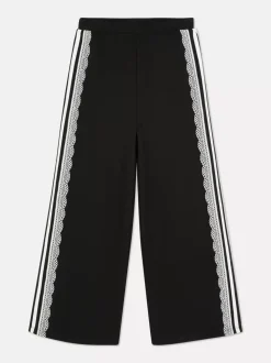 Spodnie z bocznym paskiem i koronką