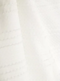 Spodnie z haftem angielskim