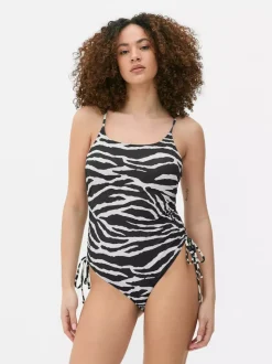 Strój kąpielowy z marszczeniami i wiązaniem z boku