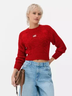 Sweter o splocie warkoczowym z amerykańską flagą