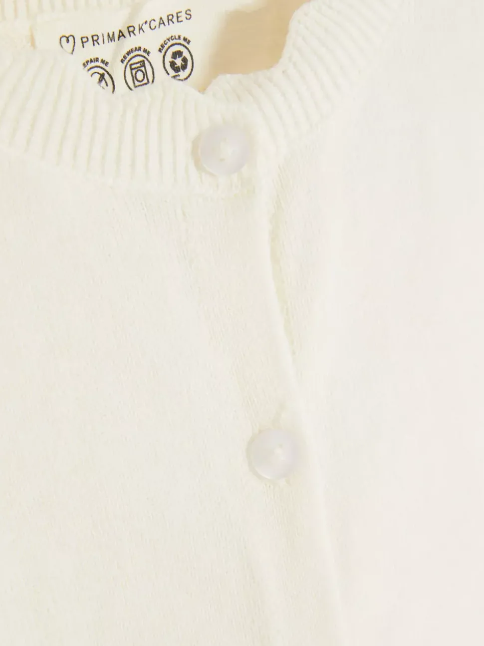 Sweter rozpinany z muszelkowym obszyciem