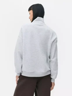 Szary sweter z suwakiem do połowy