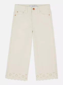 Szerokie jeansy z obszyciem z haftem angielskim