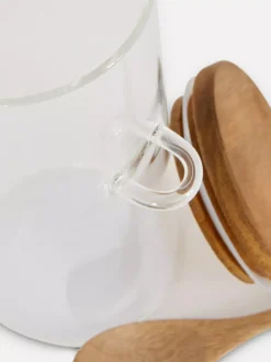 Szklany pojemnik z łyżką