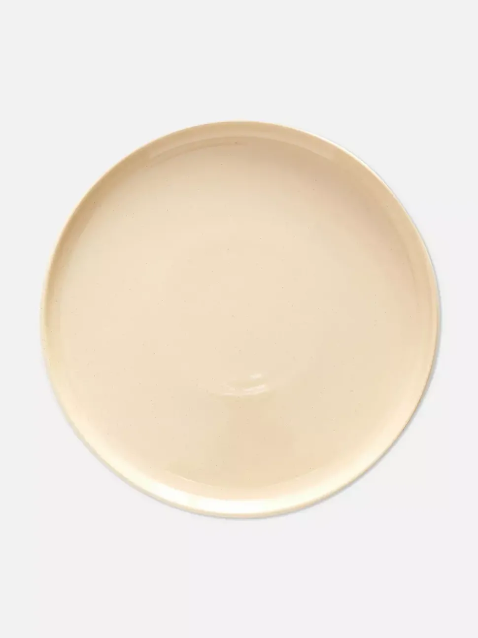 Szkliwiony talerz obiadowy z nakrapianym wzorem