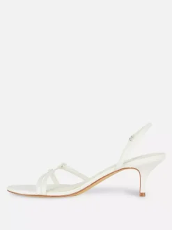 Szpilki z tylnym paskiem i obcasem typu kaczuszka