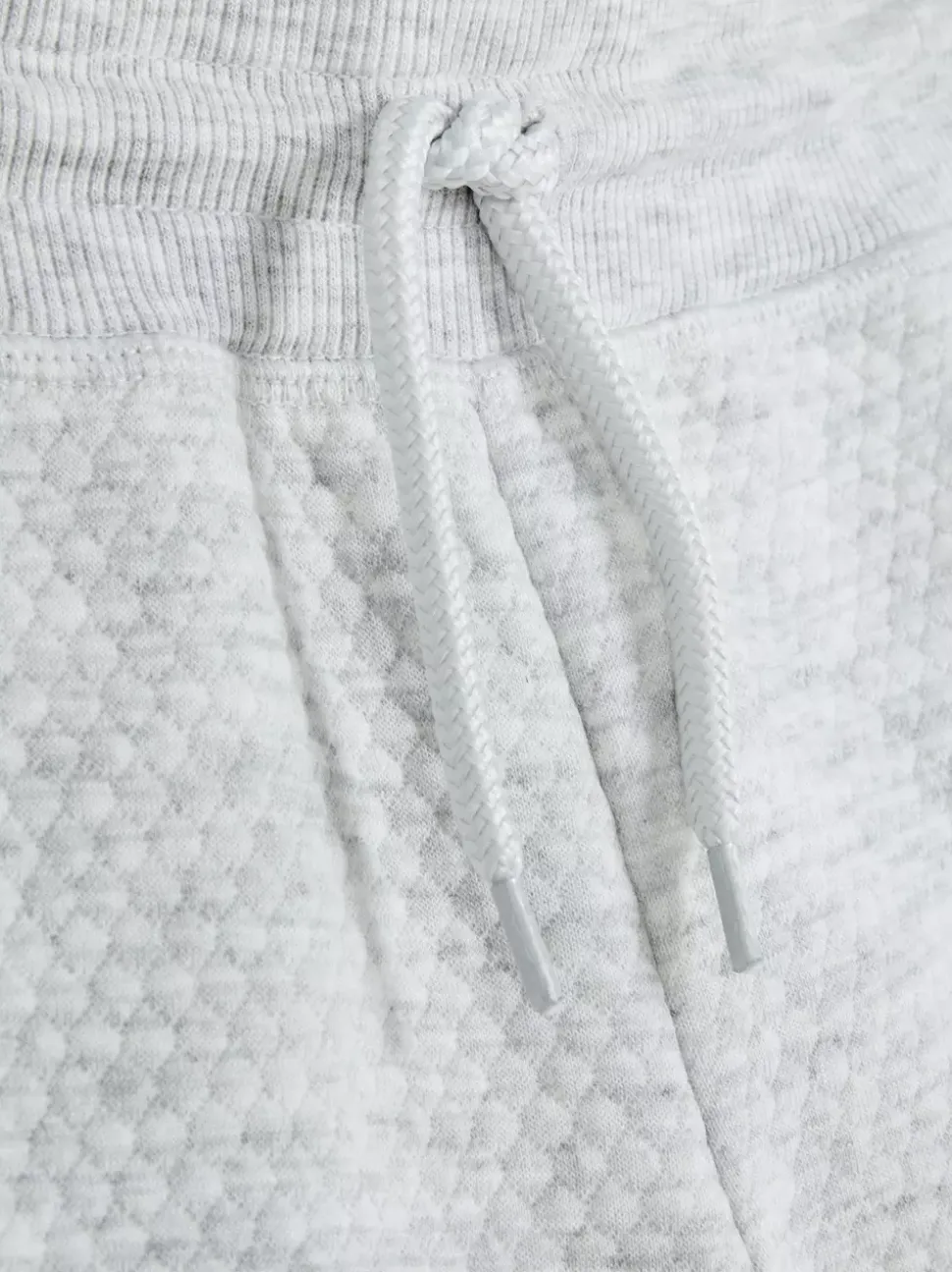 Teksturowane spodnie dresowe z geometrycznym wzorem