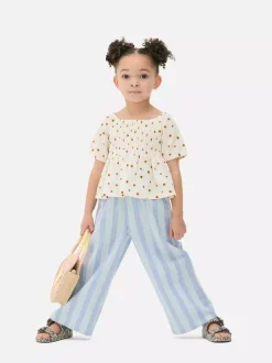 T-shirt z marszczoną fakturą i motywem słonecznika